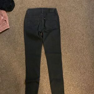 Levi black skinny jeans 710